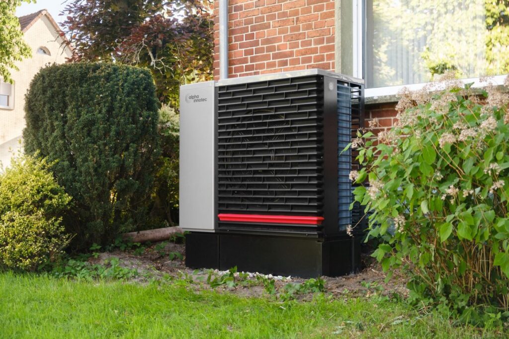 Outdoor heat pump unit installed at a home