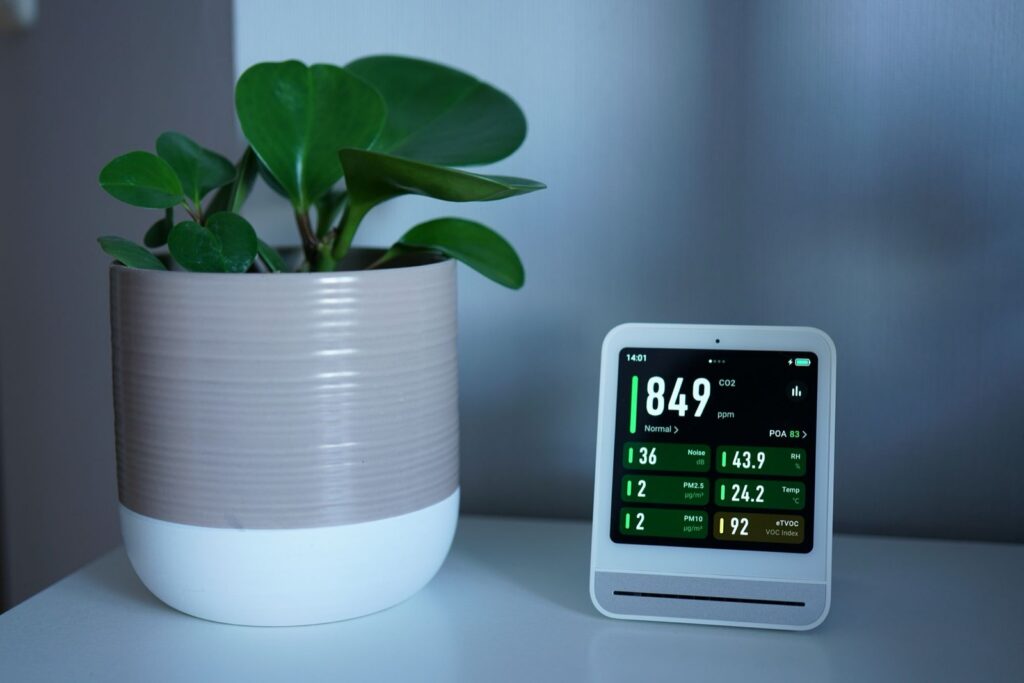 Indoor air quality monitor showing air purification metrics