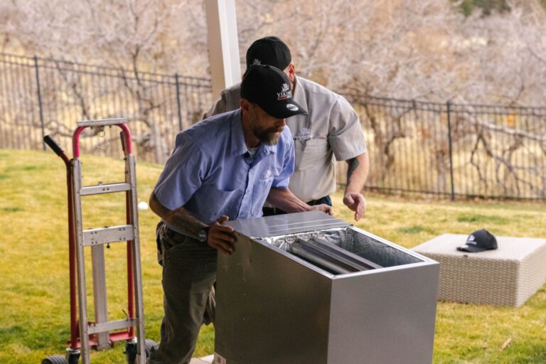 Viking Heating and Air technicians installing HVAC equipment together