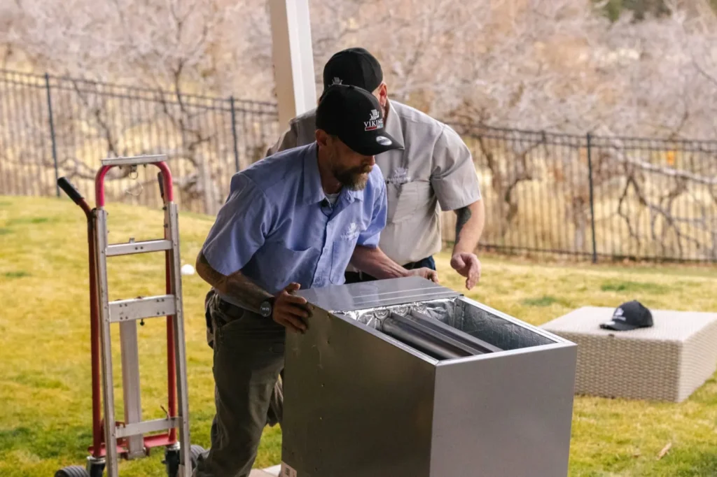 Viking Heating and Air technicians installing a new air handler unit